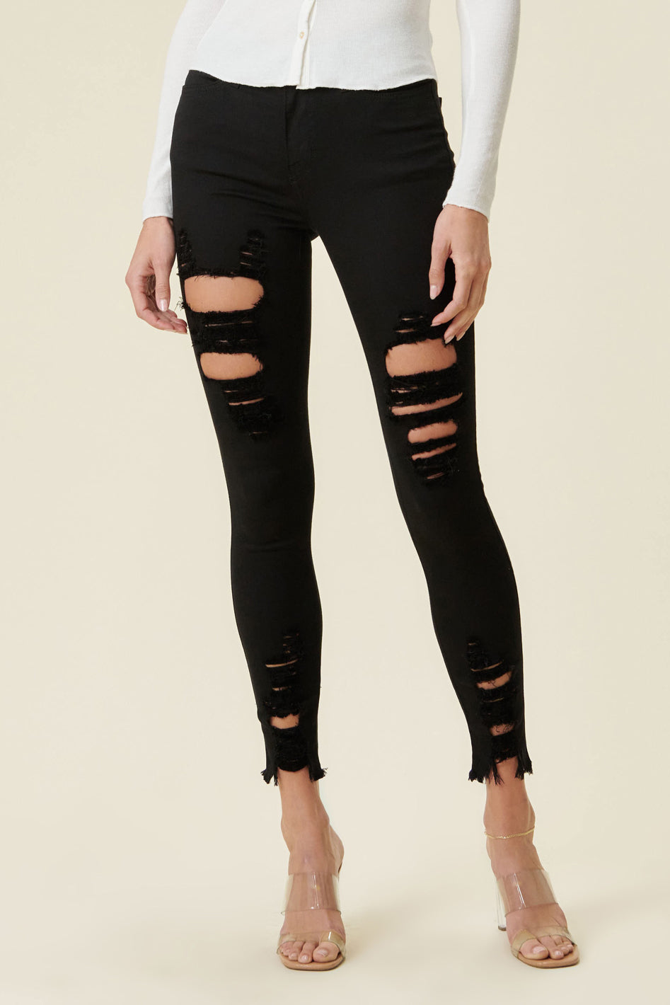 High Rise Distressed Skinny Jeans with a Raw Hem - Azoroh