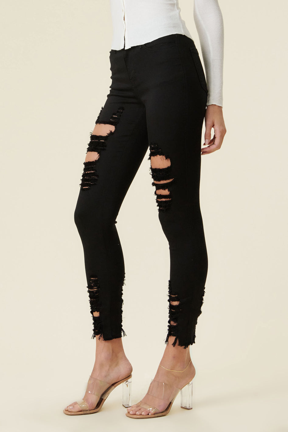 High Rise Distressed Skinny Jeans with a Raw Hem - Azoroh
